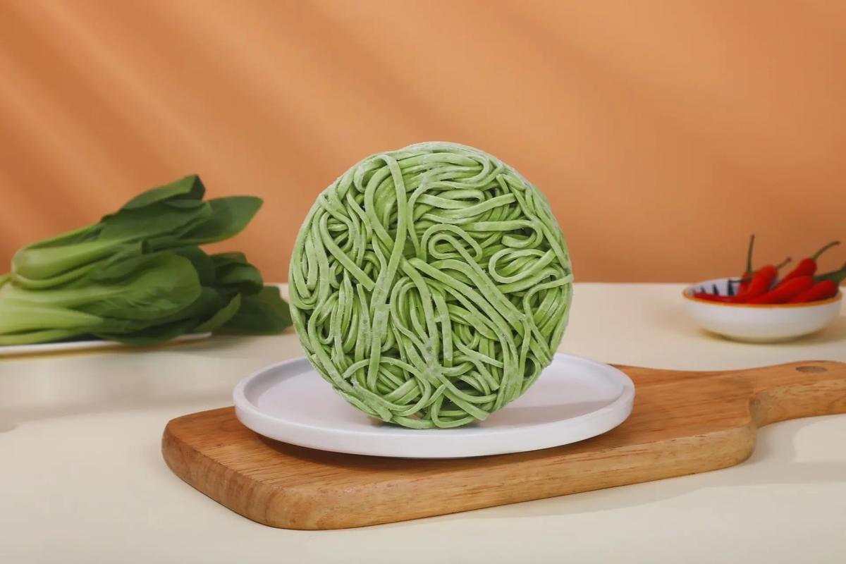 Frozen cooked noodle portions